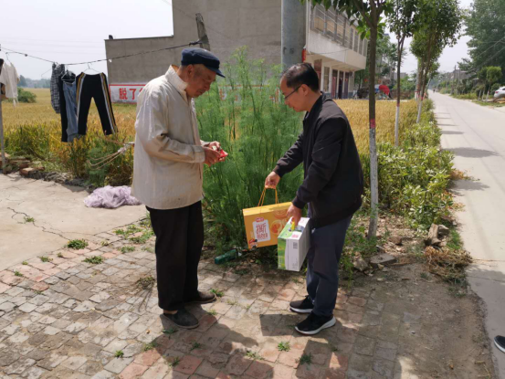 1589965099381668.png 6_周口市商务局精准扶贫 情系百姓951.png